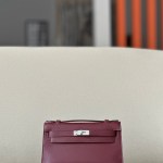 Kelly Pochette Swift Rouge H (55) Palladium Hardware
