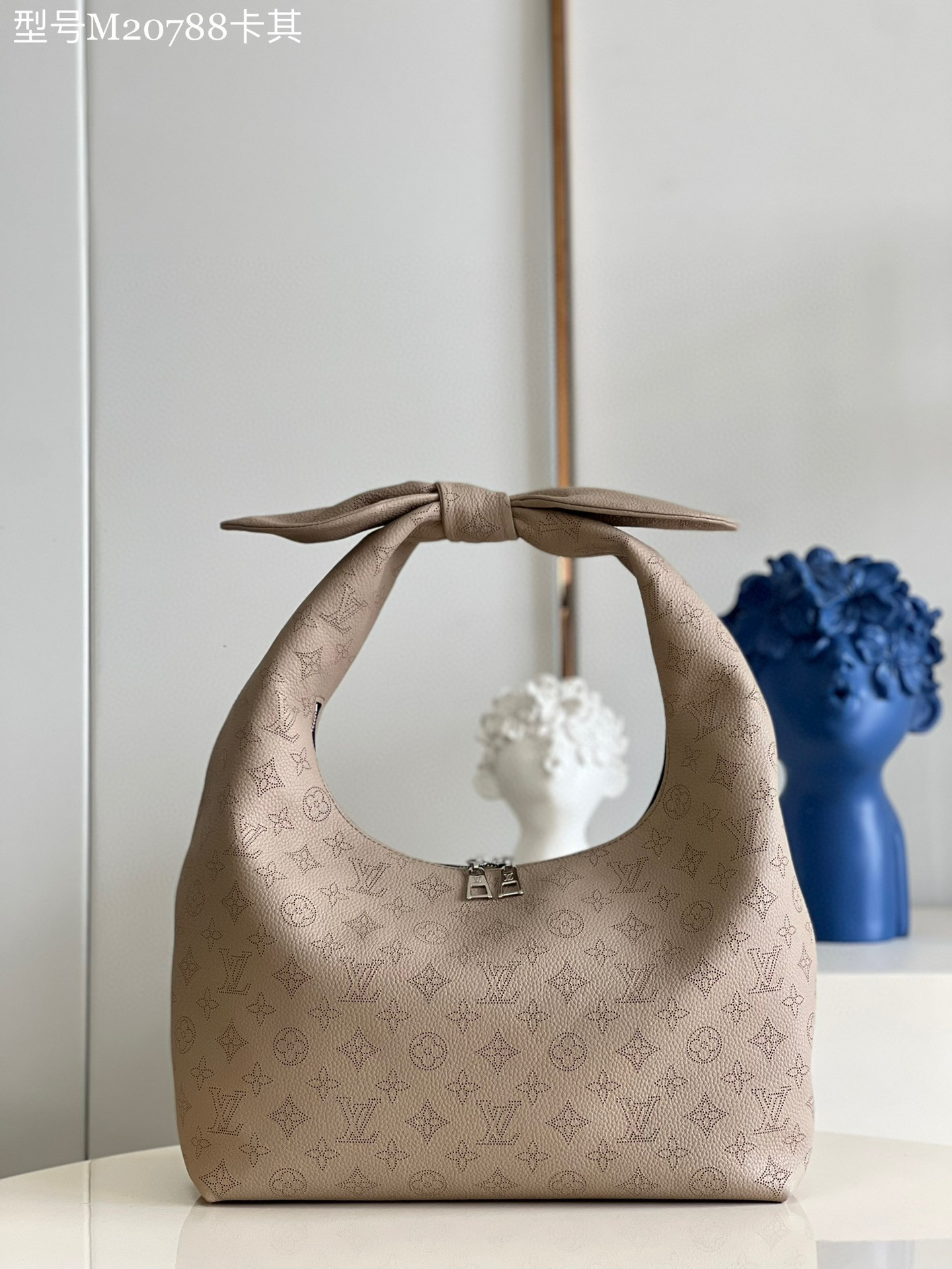 HSC-14085F354C02 Louis Vuitton Why Knot MM - Image 1